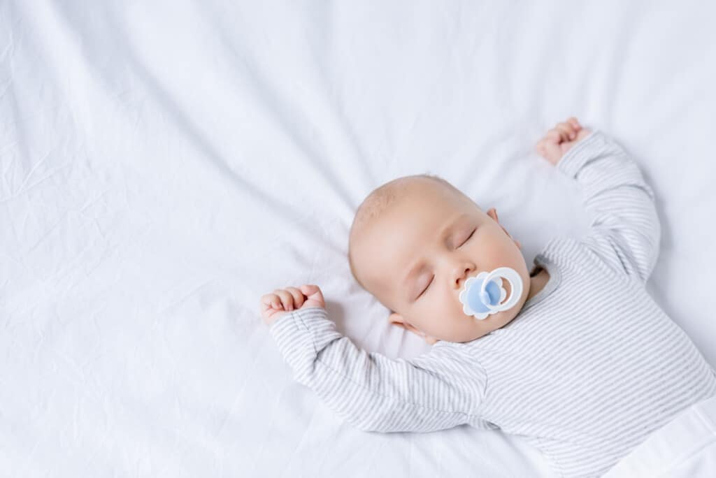 How I Got My 4 Month Old To Sleep On His Own: Merlin's Magic Sleepsuit Review